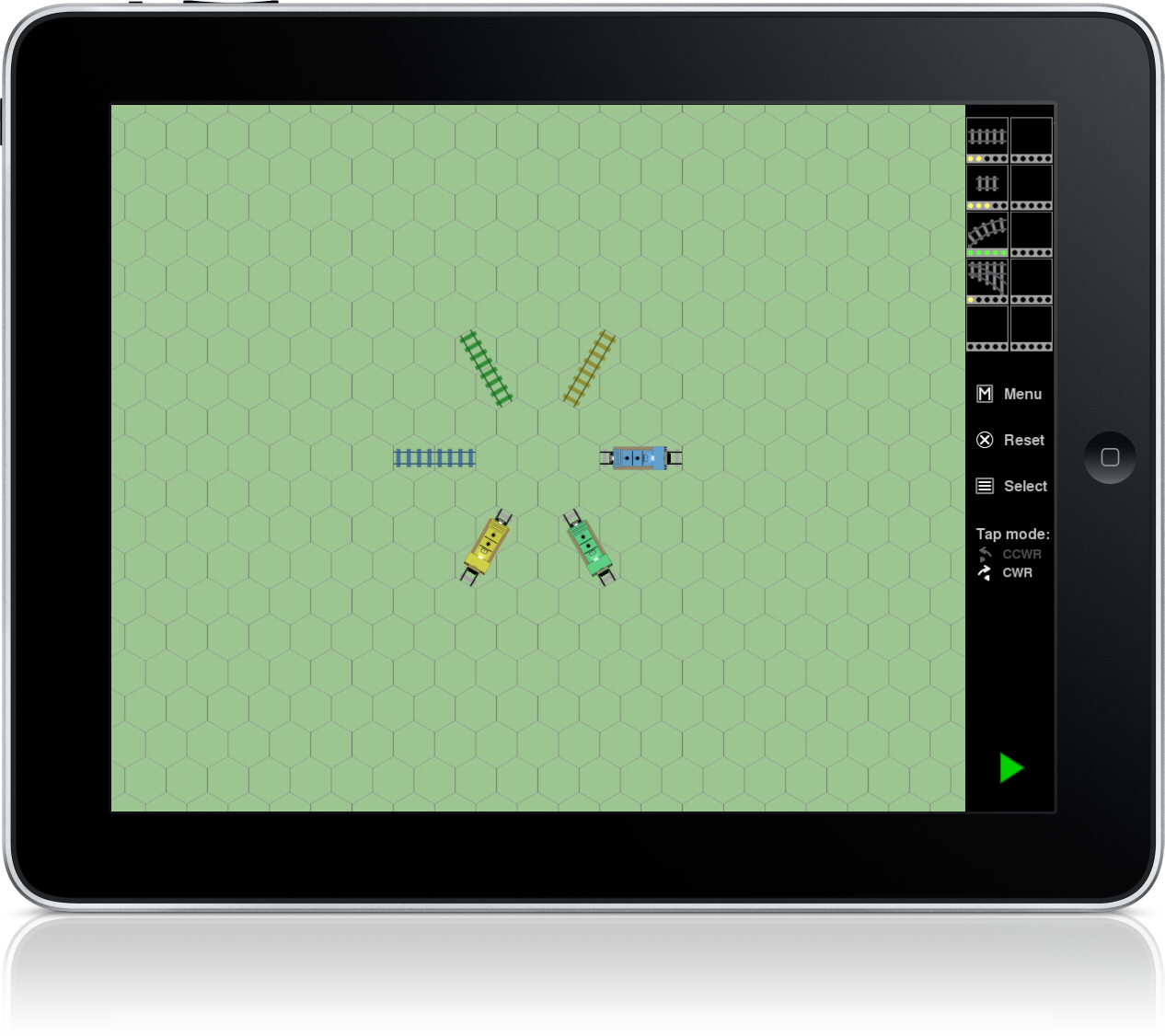 iPad: loose rails and locomotives scattered across a wide field